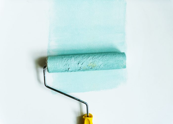 Flat lay of paint roller isolated on white background